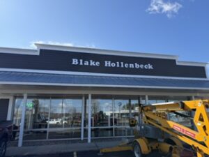 Blake Hollenbeck storefront sign mounted above the shop
