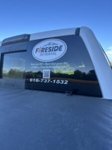 Fireside RV Rental window decal applied to a car