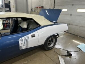 Blue Plymouth with racing number 340 applied to the door