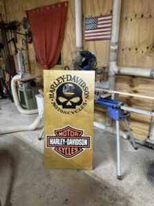 Harley-Davidson cornhole board in the workshop