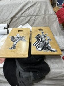 Pair of cornhole boards with a Viking mascot design