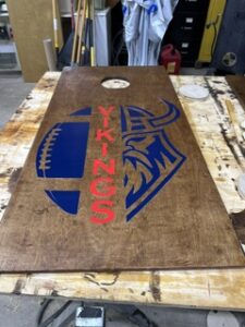Y-Zion football cornhole boards drying
