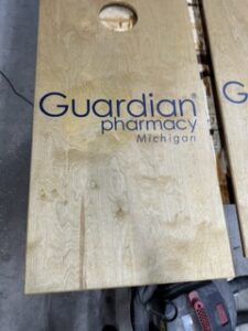 Guardian Pharmacy cornhole boards as a pair