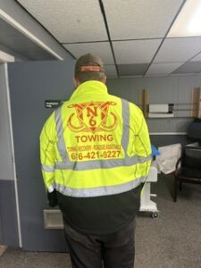 Yellow hi-vis jacket printed for Z's Towing