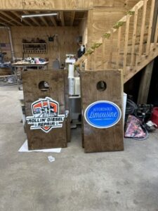 Cornhole boards branded for a limousine company