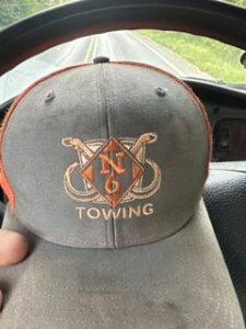 Grey cap embroidered with the Z's Towing monogram