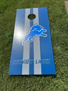 Detroit Lions cornhole board in blue and white