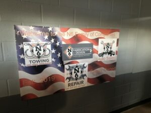 N6 trade show banner showing towing, fabrication and repair
