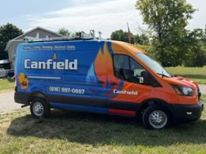Side of the Canfield van showing the full wrap
