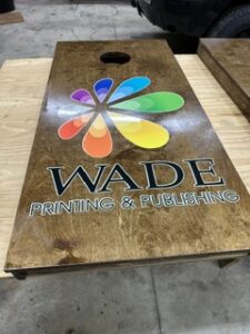 Wade Printing and Publishing cornhole board
