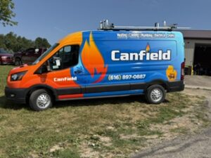 Canfield van parked outside the shop after wrapping